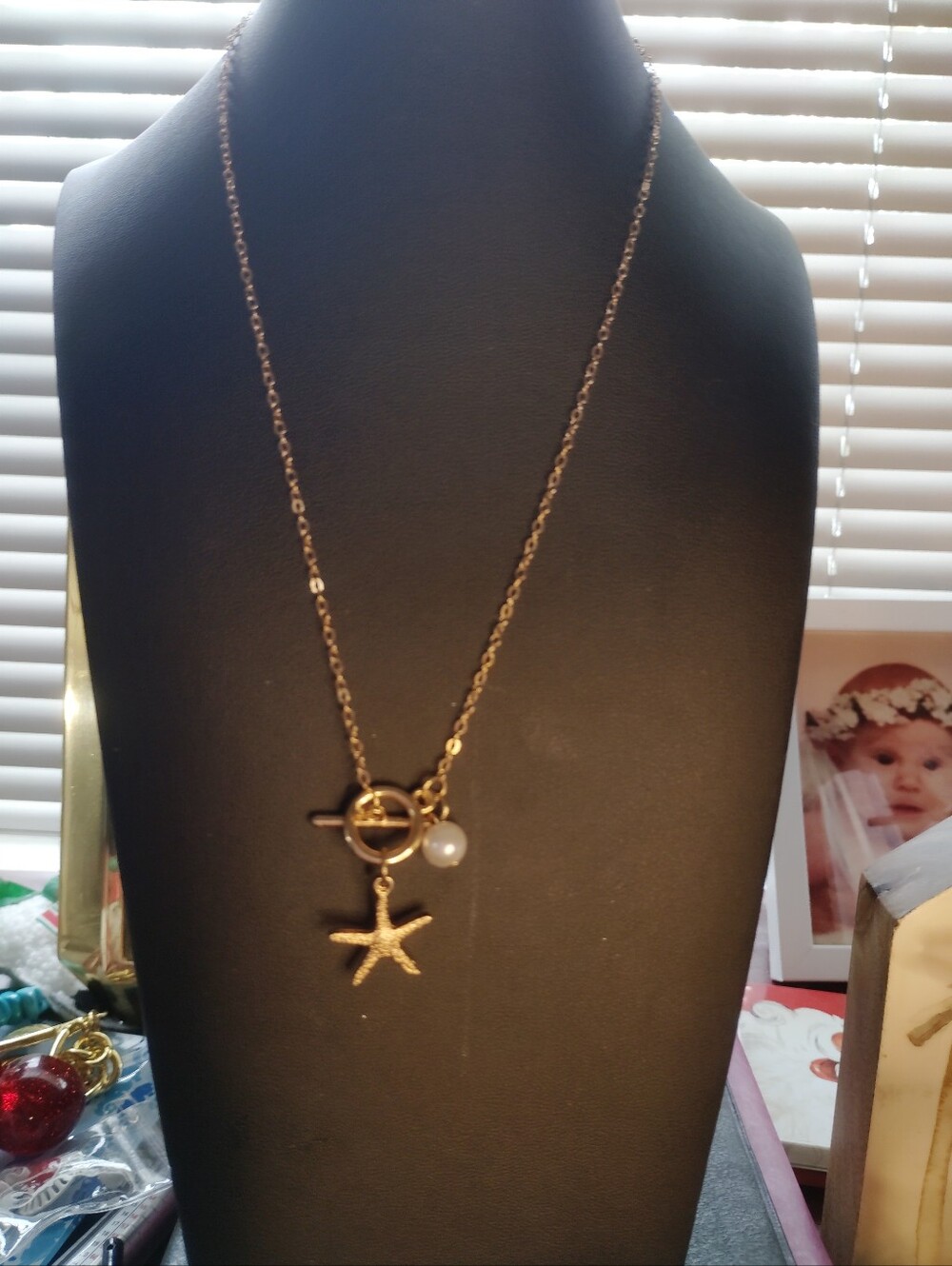 Gold Starfish Pendant Necklace with Pearl Accent